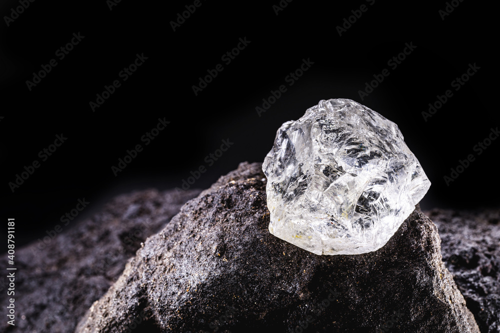 Rough diamond, uncut gemstone, mine bottom. Concept of mining and extraction of rare ores. Rough diamond, uncut gemstone, mine bottom. Concept of mining and extraction of rare ores.