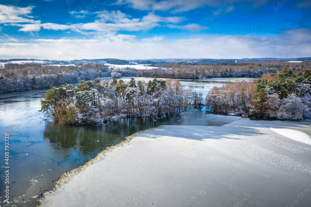 Aerial landscape of the frozen lake in Poland at winter