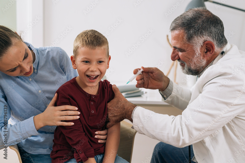 boy with his mother visit pediatrician boy with his mother visit pediatrician