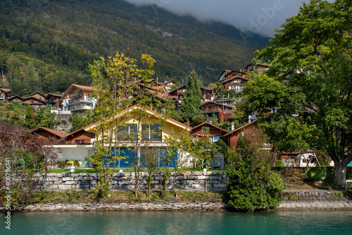  Wood chalets at the shores of lake Brienz. Interlaken, Switzerland.