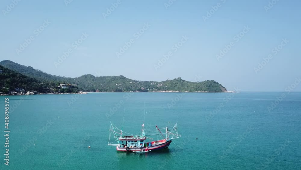 Fishermen at work on their fishing boat, Thailand Fishermen at work on their fishing boat, Thailand