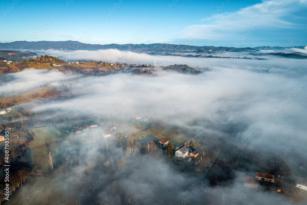 Aerial view of foggy sunrise in Bosnian countryside Aerial view of foggy sunrise in Bosnian countryside