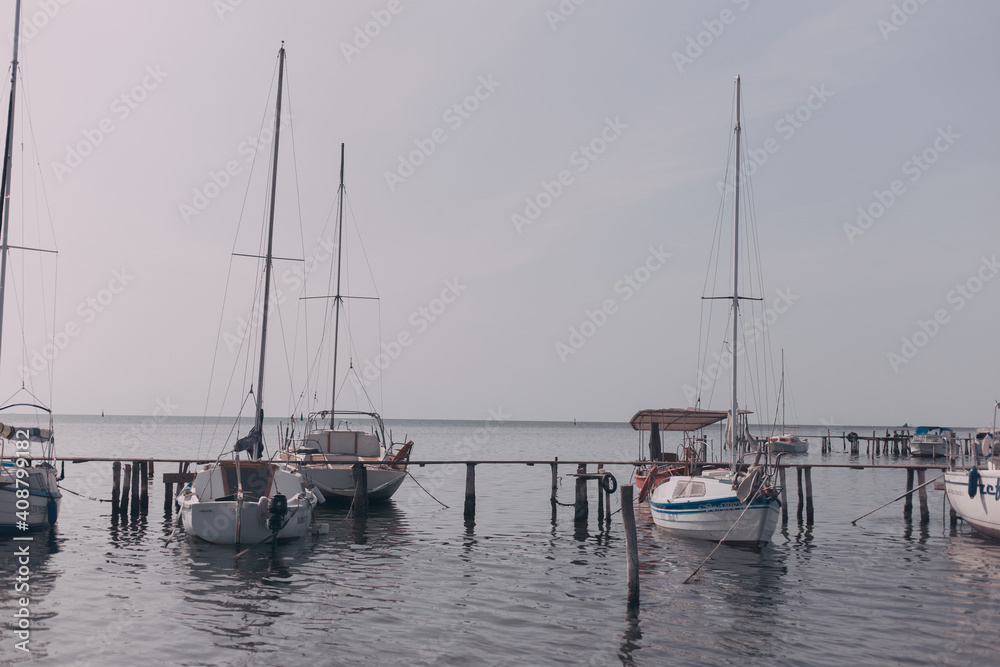Motor and sailing boats, yachts in the harbor
