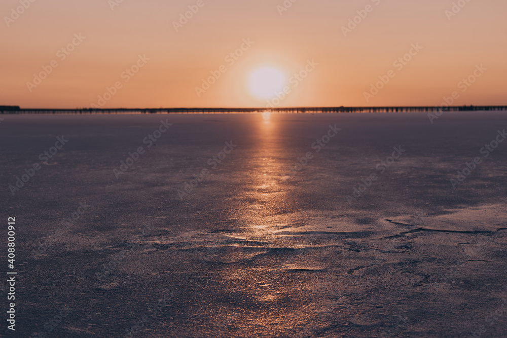 Fototapeta premium Beautiful sunset over the salty pink lake