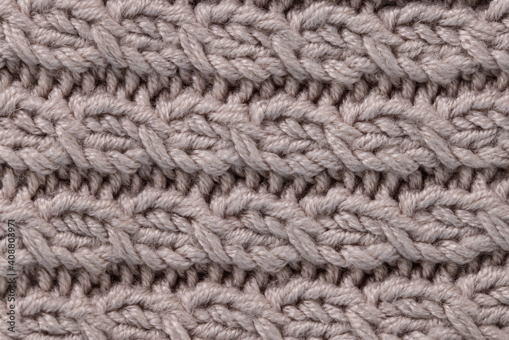 grey textured background with a pattern pigtail. grey textured background with a pattern pigtail.