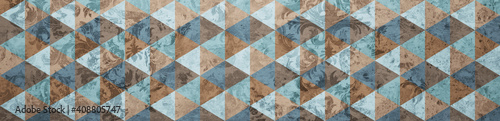 Old brown gray grey brown blue vintage worn shabby patchwork motif tiles stone concrete cement wall wallpaper texture background banner panorama  with damask geometric hexagonal hexagon triangle print