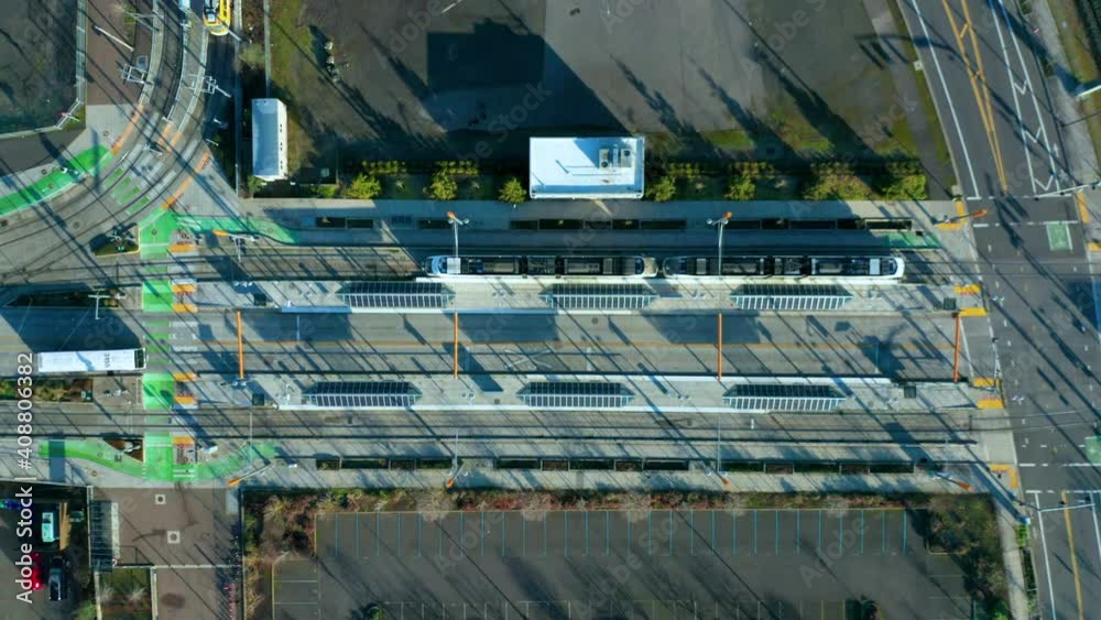 Commuter Train Bus coming and going from Pedestrian Station near the Tilikum Crossing Bridge Willamette River Portland Oregon