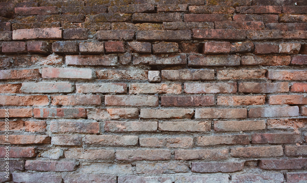 Old red brick wall background texture.