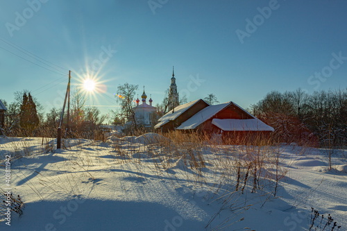 Winter village on a sunny day © Amikphoto