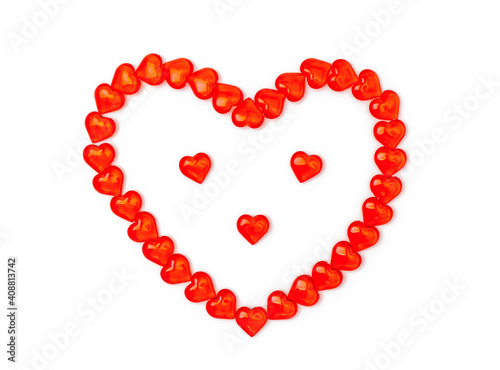 Beautiful heart in form of face with eyes  nose consists of small red figures of hearts.   oncept of congratulations for Valentines Day  holidays  Love. Isolated on white background. Flatly  top view