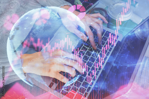 Double exposure of woman hands typing on computer and business theme hologram drawing. Success concept.