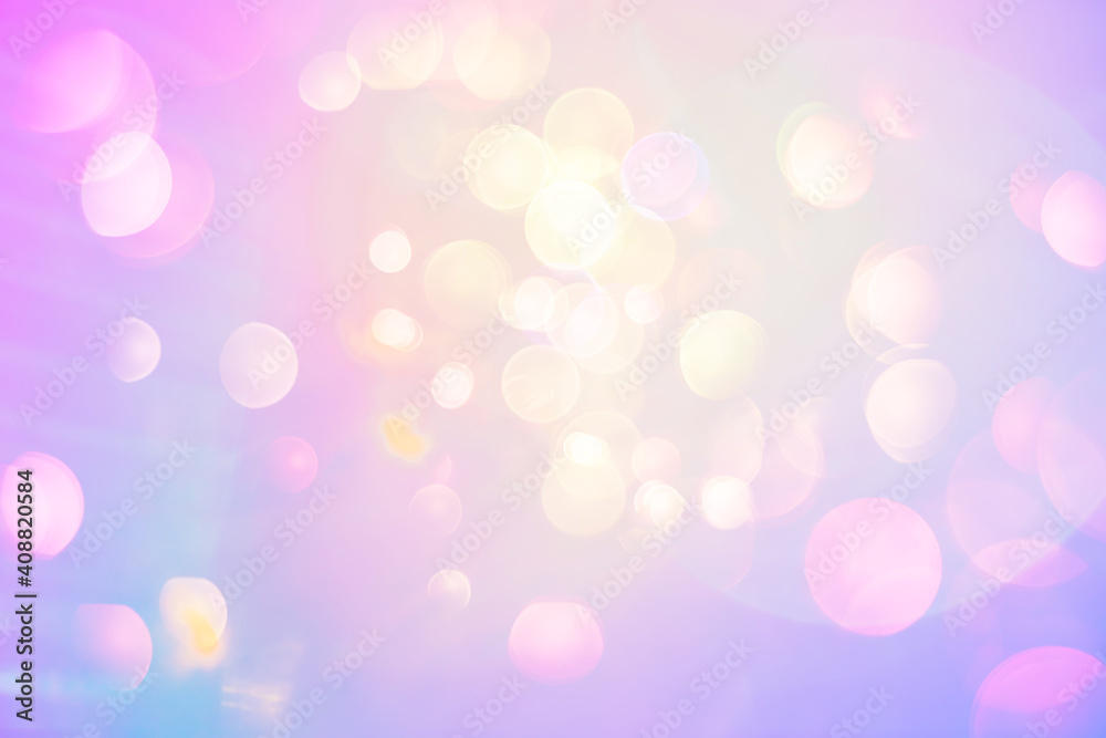 Bright pearly fantasy background. Lens flare bokeh in neon colors on a sunny sky. Funny summer or spring texture