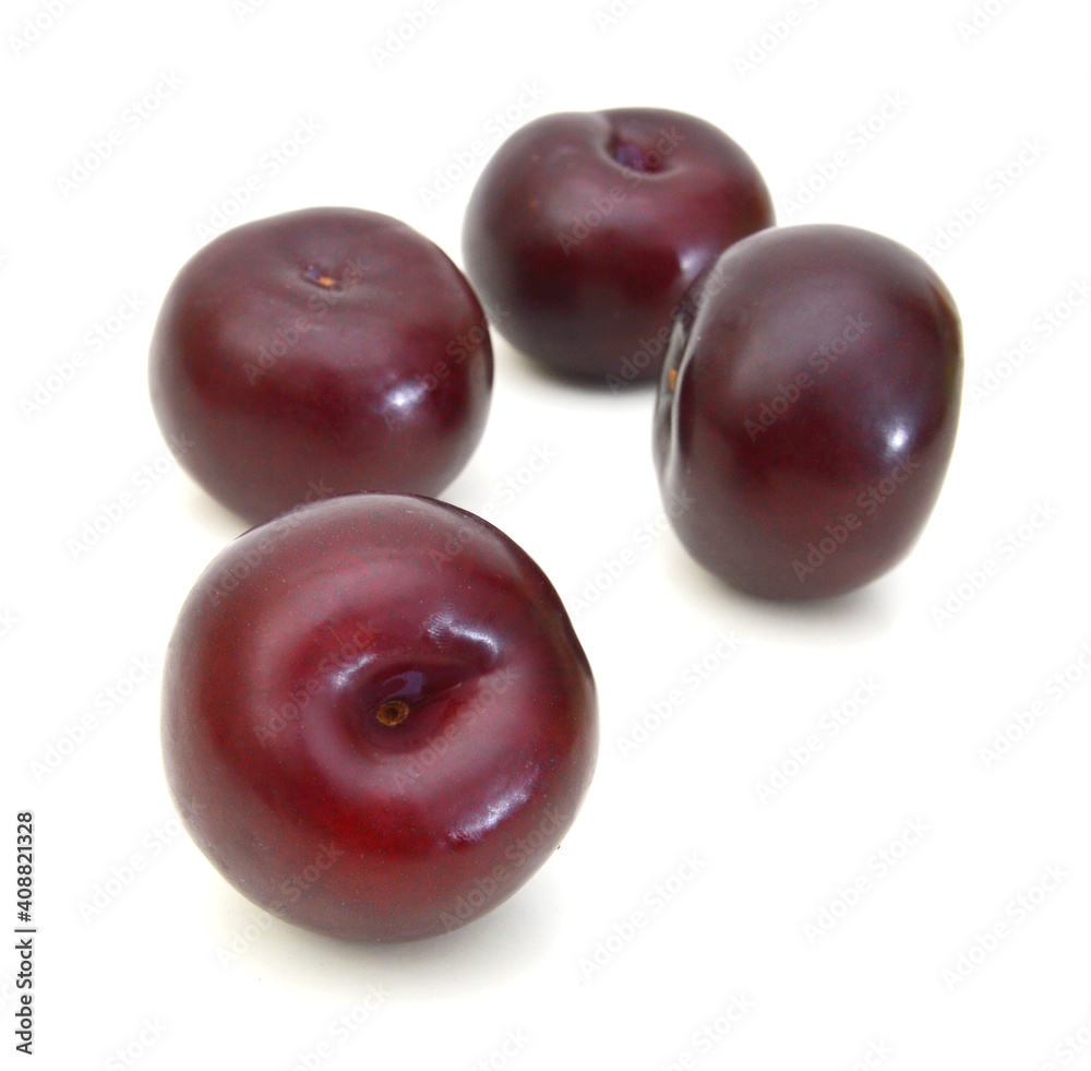 Red plum fruit isolated on white background Red plum fruit isolated on white background