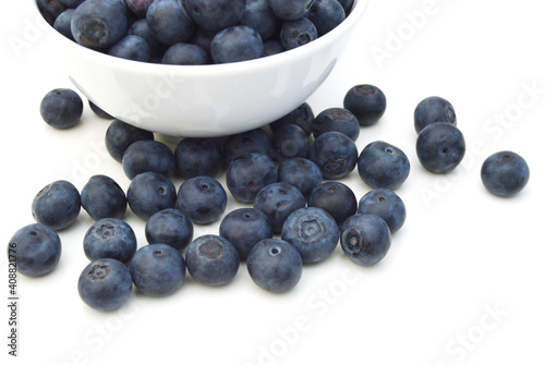 blue berry in white plate on white background