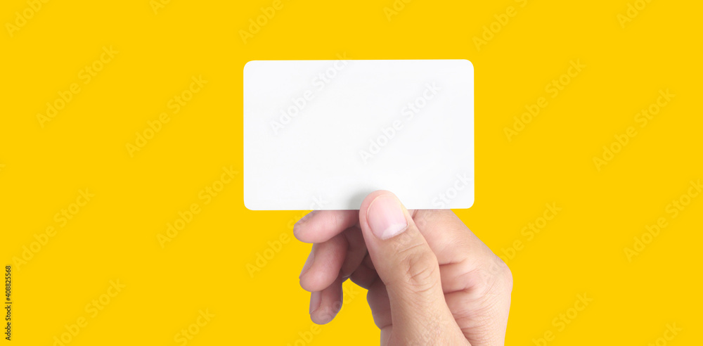 Close up of hand holding virtual card with. Credit card in hand Close up of hand holding virtual card with. Credit card in hand