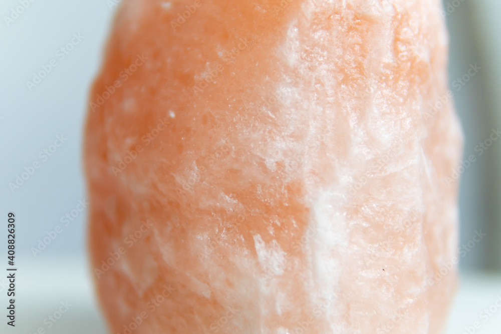 Fototapeta premium large piece of orange salt lamp close-up