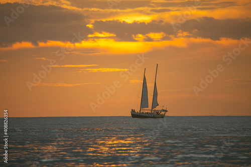 Sailing yatch in the sunset in Tamarindo Beach of Costa Rica, Central America...