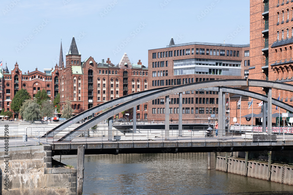 The Old Warehouse District is a historic district in Hamburg and there are old brick warehouses along the canals.