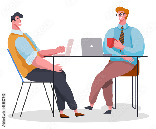 Businessmen dressed in formal clothes are sitting at the table with laptops and talking. Office workers discussing matters. Business meeting and consideration of working issues. Friendly team work