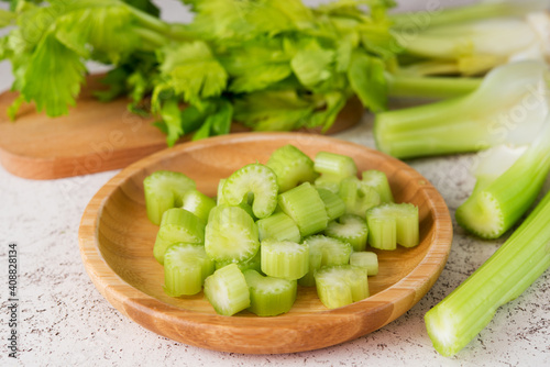 Fresh celery stalks cut into pieces for cooking
