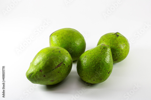 Wallpaper Mural Some fresh green avocado. White Clipping Path. Close-up Avocado. Full depth of field. Isolated on white background. Professional food photography Torontodigital.ca