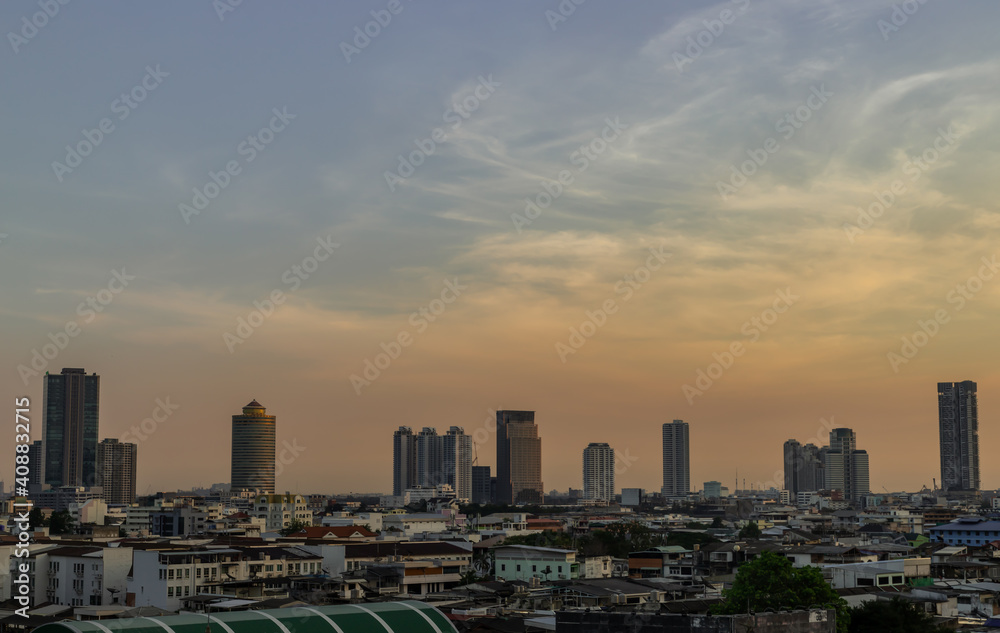 Fototapeta premium Aerial view of Beautiful scenery view of Skyscraper Evening time before Sunset creates relaxing feeling for the rest of the day. Selective focus.