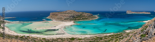 Amazing Panoramic view of Balos Lagoon near Chania, with magical turquoise waters, lagoons, tropical beaches of pure white, pink sand and Gramvousa island on Crete, Cap tigani in the center . Greece