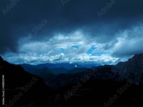 View of Karavanke mountains and Julian alps in clouds in Slovenia