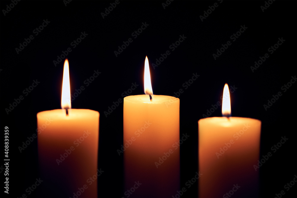close up flame candles on black background close up flame candles on black background