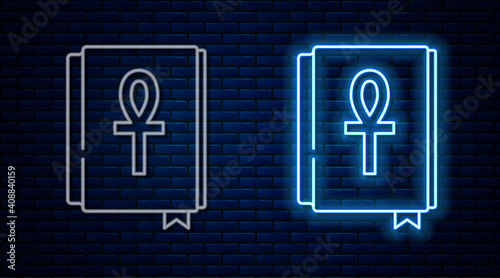 Glowing neon line Cross ankh book icon isolated on brick wall background. Vector.
