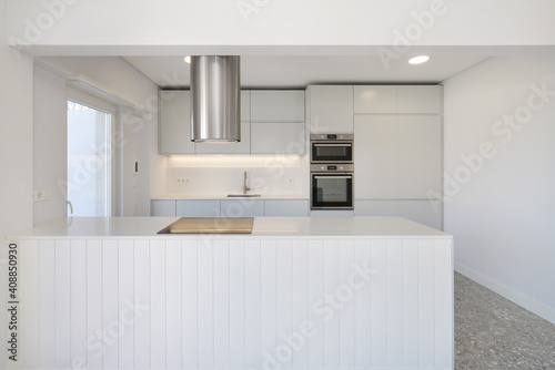 Modern kitchen with white cabinets 