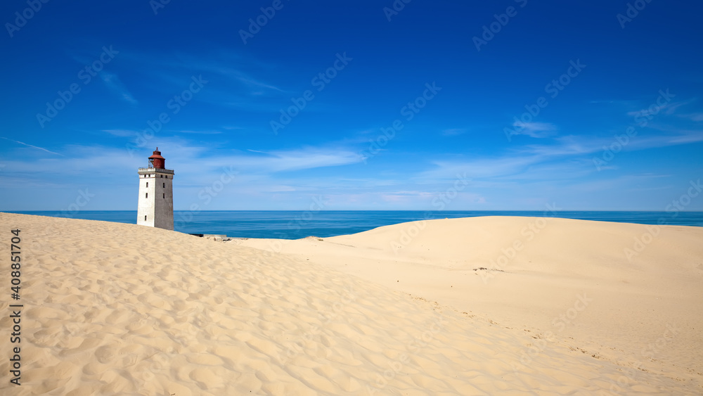 View of the Rubjerg Knude, sand dune and lighthouse at the west coast of Denmark