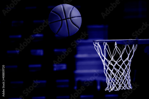 Basketball scoring basket at a sports arena. Blue color filter © Augustas Cetkauskas