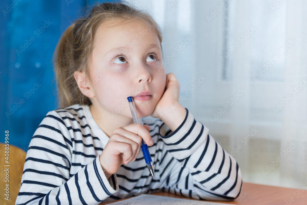 Dreamy little girl sit at desk studying look in distance visualizing or thinking, small child dreamer feel unmotivated distracted from preparing doing homework at home, lost in dreams or imagination Dreamy little girl sit at desk studying look in distance visualizing or thinking, small child dreamer feel unmotivated distracted from preparing doing homework at home, lost in dreams or imagination