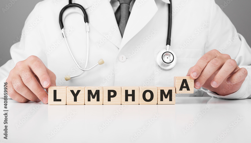 Doctor holds wooden cubes in his hands with text Lymphoma Doctor holds wooden cubes in his hands with text Lymphoma
