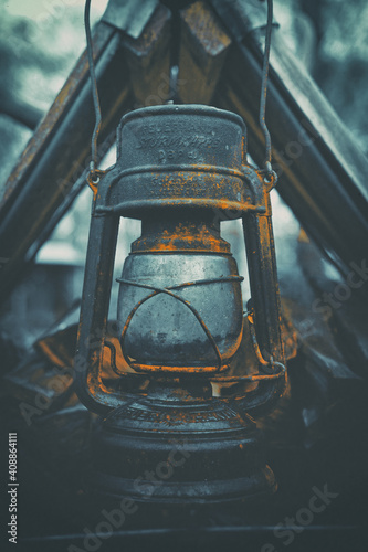 A very old metal mining oil lamp