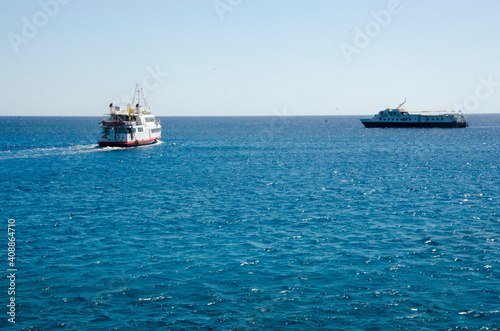 two ships sail at sea