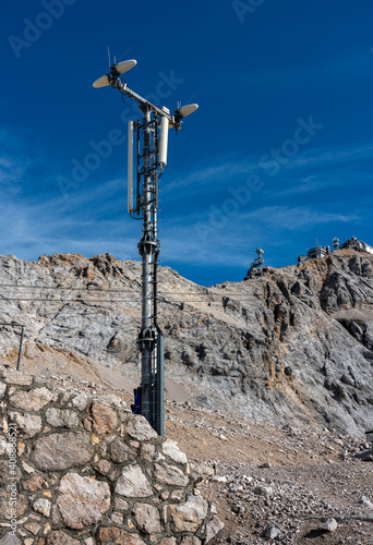 Tourists and technical equipment on the Zugspitze in Bavaria