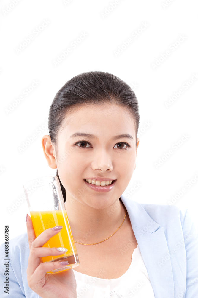 Oriental fashion woman drinking orange juice Oriental fashion woman drinking orange juice