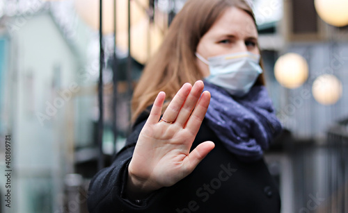 young european woman in protective disposable medical mask. concept protection of dangerous 2019-nCoV influenza coronavirus, mutated and spreading in China