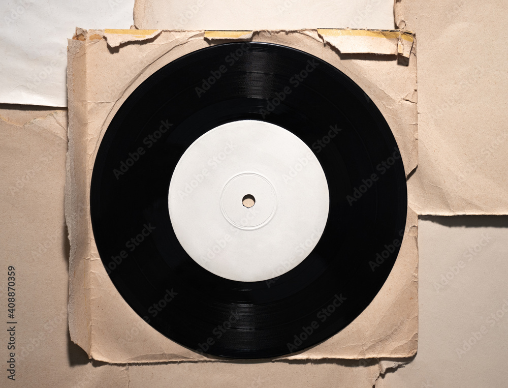 Obraz premium Vinyl records with vintage paper top view