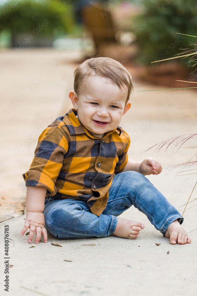 A baby boy eleven months old outdoors in the winter in a downtown setting. A baby boy eleven months old outdoors in the winter in a downtown setting.
