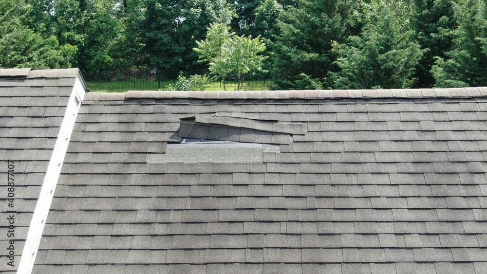 Aerial Drone Close Up of Roof Damage, Missing Shingles
Aerial Drone Close Up of Roof Damage, Missing Shingles