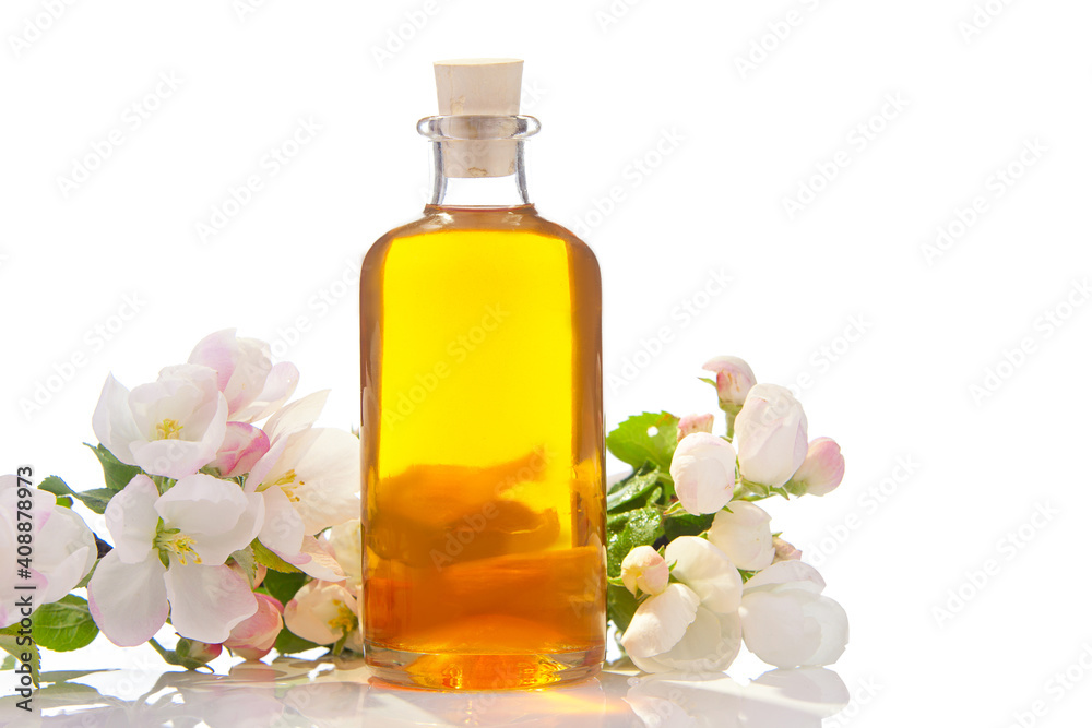 Essence of flowers on table in beautiful glass jar Essence of flowers on table in beautiful glass jar