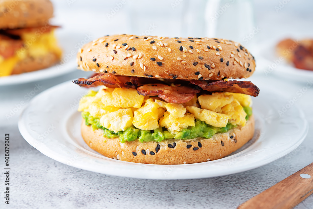 Fried bacon avocado cheese egg salad bagel Fried bacon avocado cheese egg salad bagel