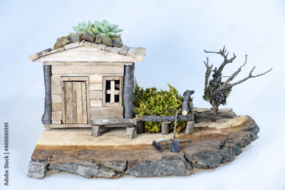 Fototapeta premium Model house model transformed into art with manual labor