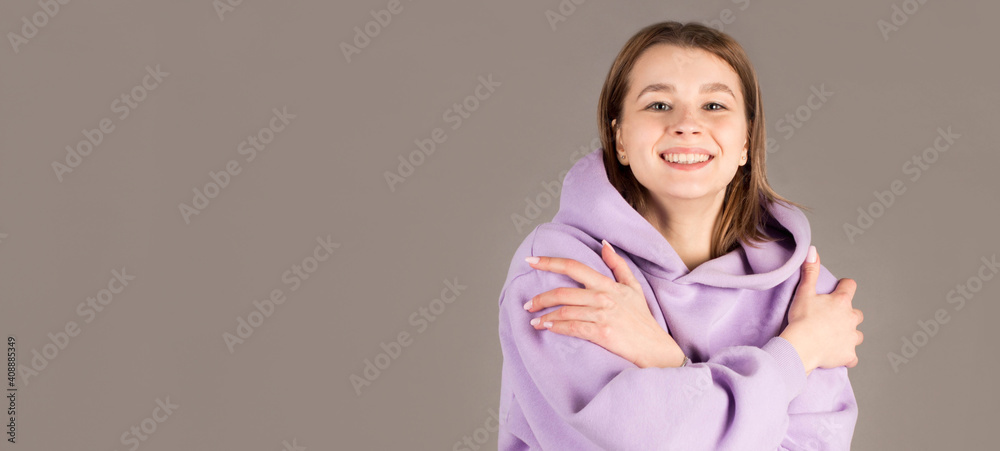Yourself style stylish person optimist positive concept. Close up portrait of cute lovely charming adorable calm peaceful pleased girl hugging her shoulders isolated on gray background Yourself style stylish person optimist positive concept. Close up portrait of cute lovely charming adorable calm peaceful pleased girl hugging her shoulders isolated on gray background