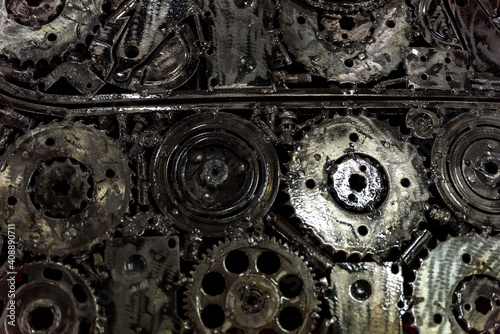 Industrial background with metal elements. Welded modes and elements of mechanical transmissions.