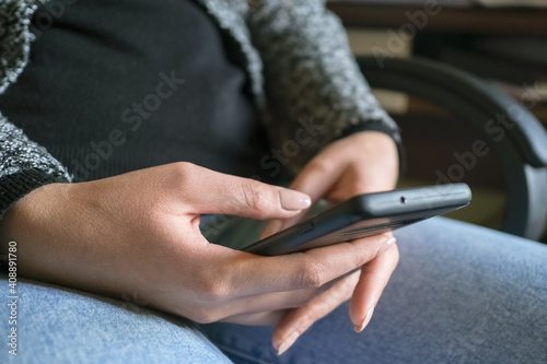 Woman using smartphone for messaging chat on a smartphone,social network tech addiction