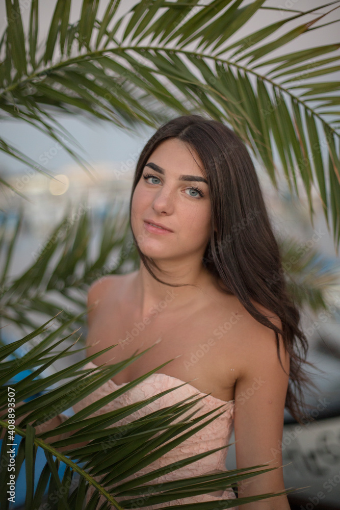 Young slim beautiful woman on sunset beach Young slim beautiful woman on sunset beach